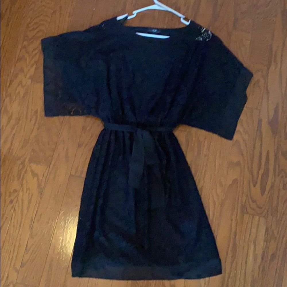 NWOT never worn. Very flattering.